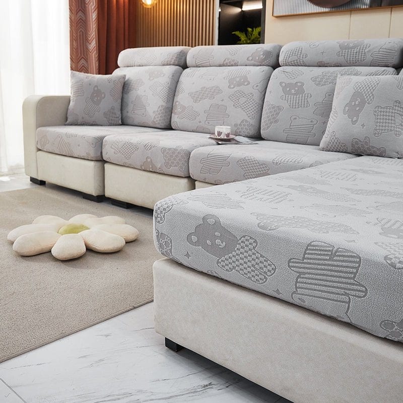 Housse bleue ajustée sur coussin de canapé