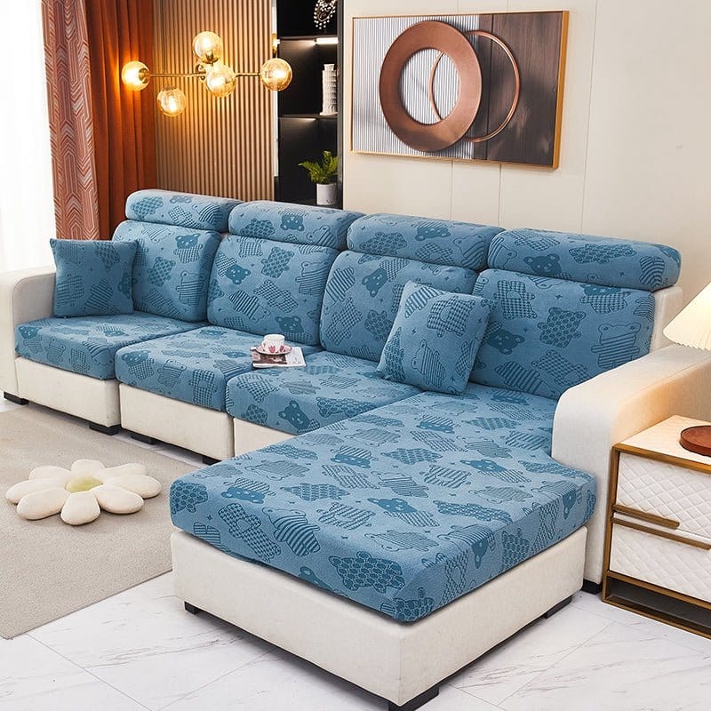 Housse polaire bleue avec motif ours sur coussin de canapé