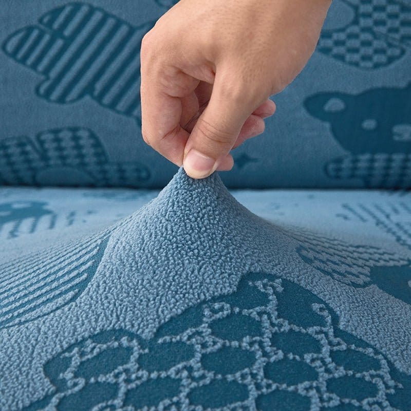 Détail du motif ours sur housse polaire pour coussin
