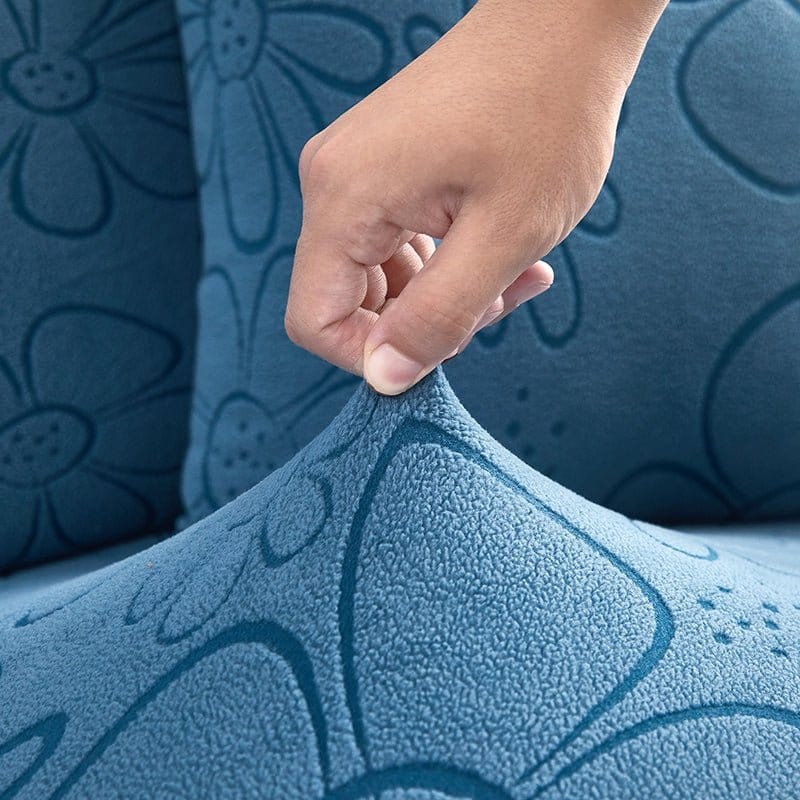 Housse polaire bleue avec motif floral sur coussin de canapé