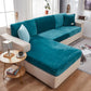 Housse en velours bleu turquoise sur canapé, texture douce