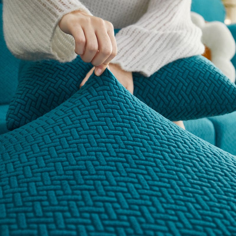 Housse polaire bleue turquoise sur coussin de canapé