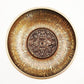 Bol chantant tibétain avec motifs dorés sur fond noir