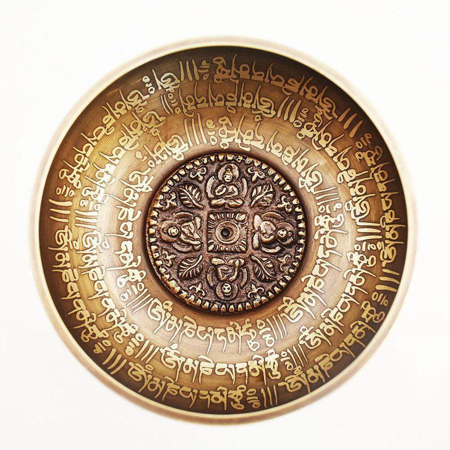 Bol chantant tibétain avec motifs dorés sur fond noir