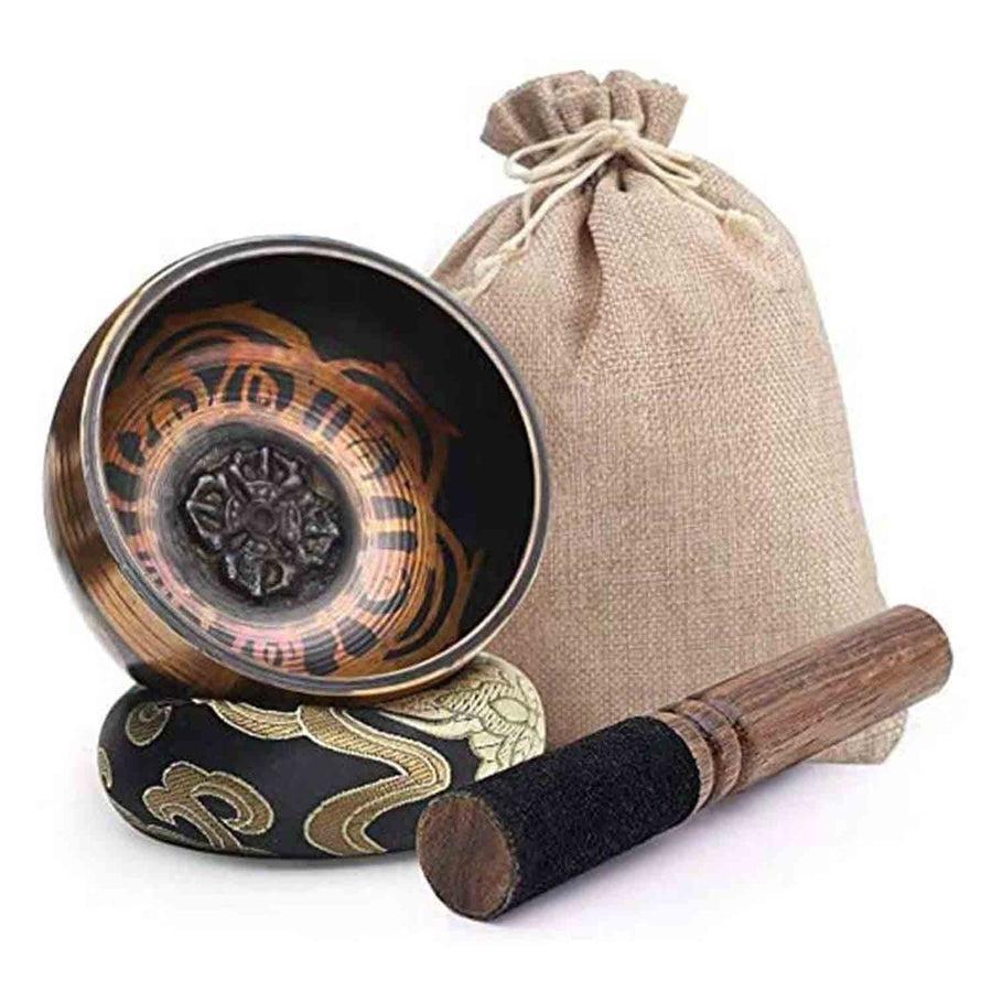 Bol chantant tibétain posé sur un support décoratif