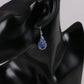 Boucles pendantes avec opale et reflets multicolores
