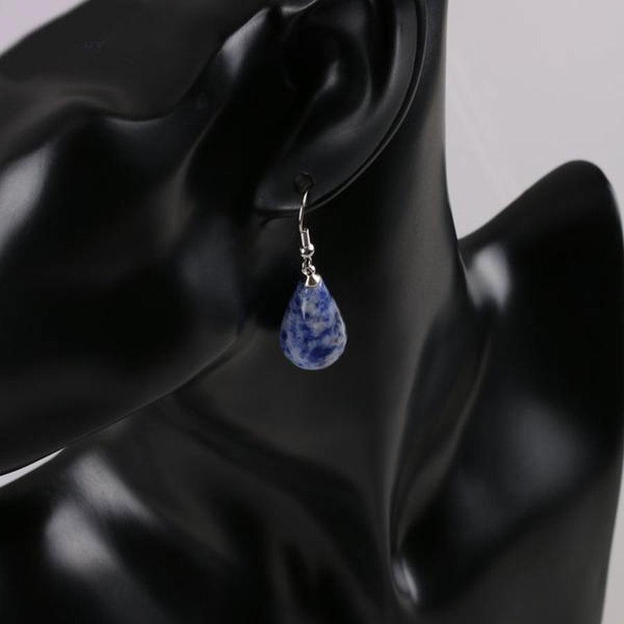 Boucles pendantes avec opale et reflets multicolores