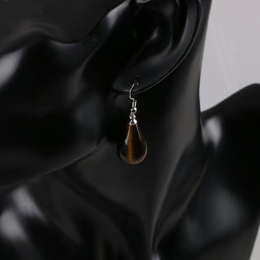 Boucles pendantes avec pierre opale aux reflets irisés