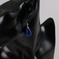Boucles goutte d'eau avec pierre cornaline rouge vibrante