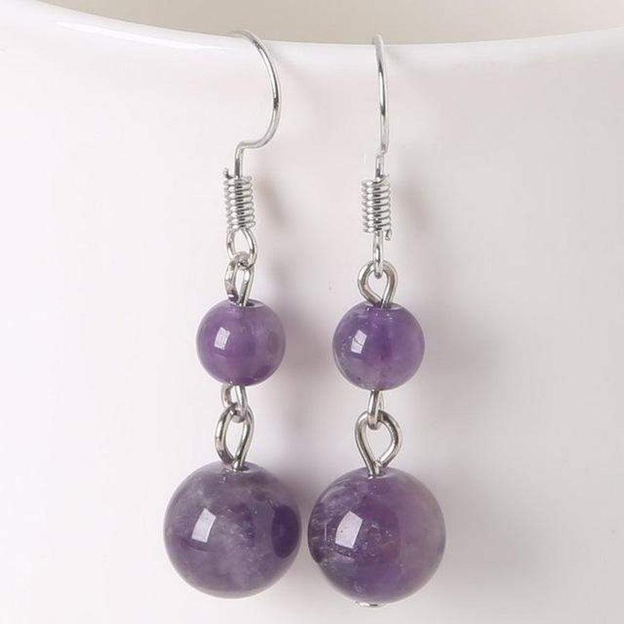 Boucles d'oreilles améthyste, détails des perles et crochets