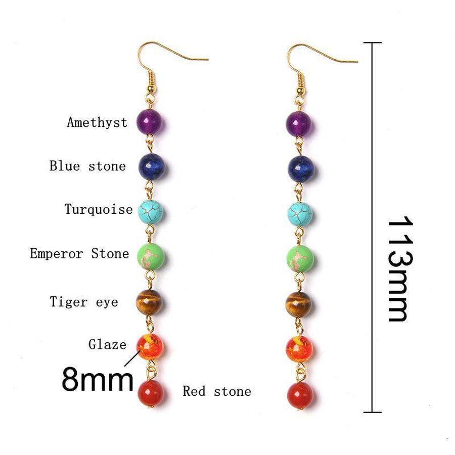 Vue d'ensemble des boucles d'oreilles avec pierres chakra variées