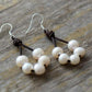 Boucles d'oreilles avec perles sur cuir noué