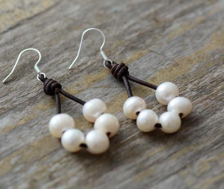 Boucles d'oreilles avec perles sur cuir noué