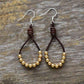Boucles d'oreilles artisanales avec perles et cuir