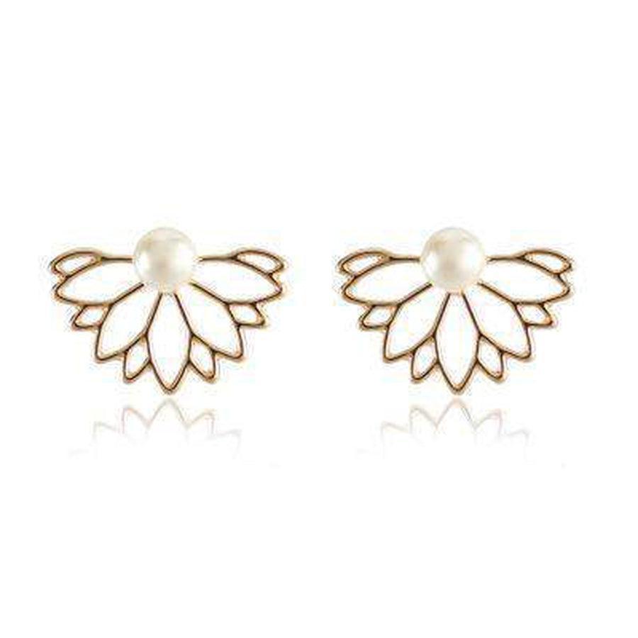 Boucles d'oreilles lotus avec ombre douce sur fond