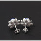 Perles lapis lazuli entourées de pétales en argent