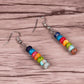 Ensemble complet des boucles d'oreilles avec toutes les pierres visibles