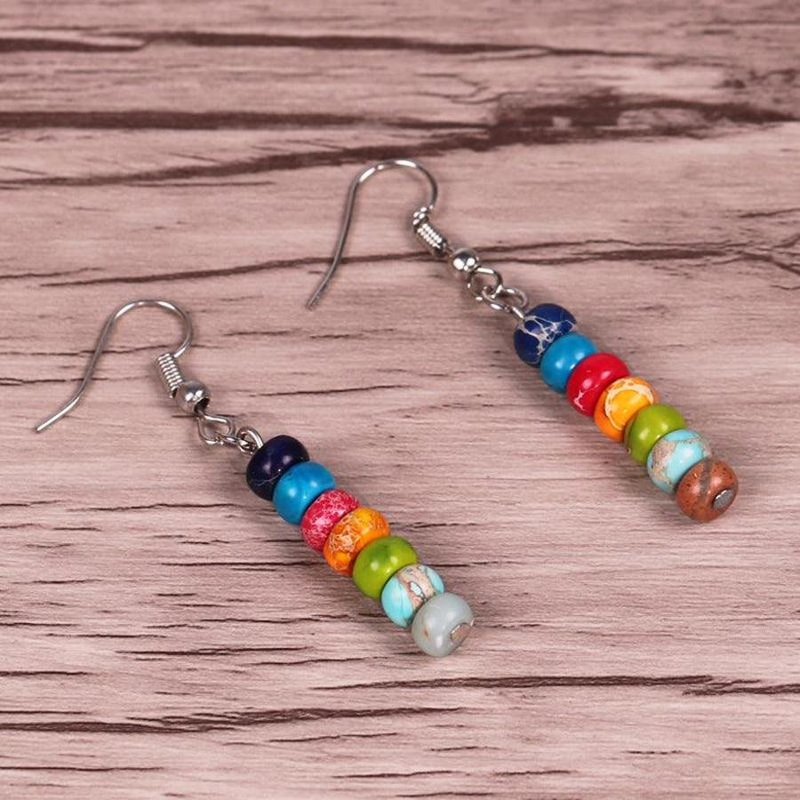 Ensemble complet des boucles d'oreilles avec toutes les pierres visibles