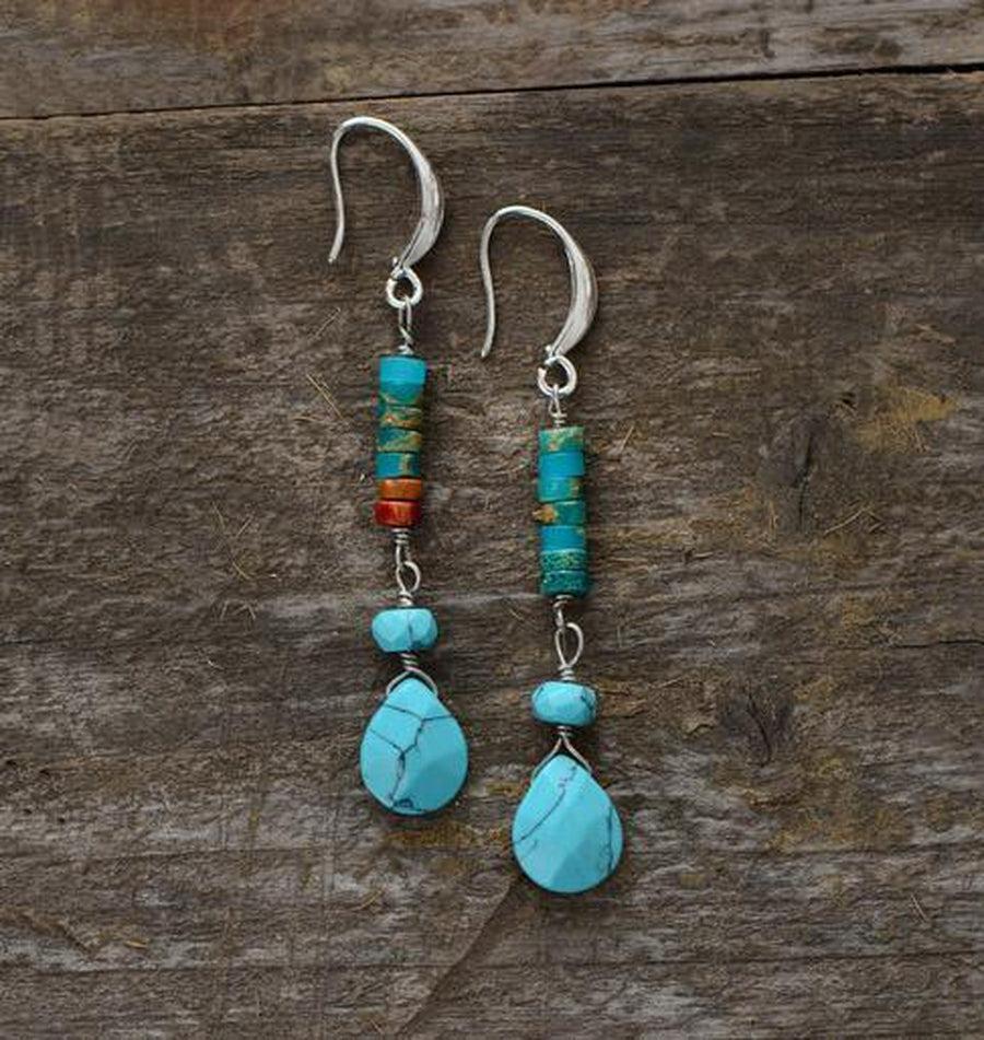 Boucles d'oreilles turquoise montrées en perspective