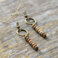 Détail des pierres de jaspe sur boucles d'oreilles artisanales