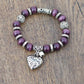 Bracelet en améthystes avec pendentif cœur en gros plan