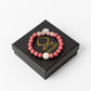 Gros plan sur perles de quartz rose, rhodochrosite et pierre de lune