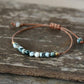 Détail du nœud coulissant du bracelet en jaspe