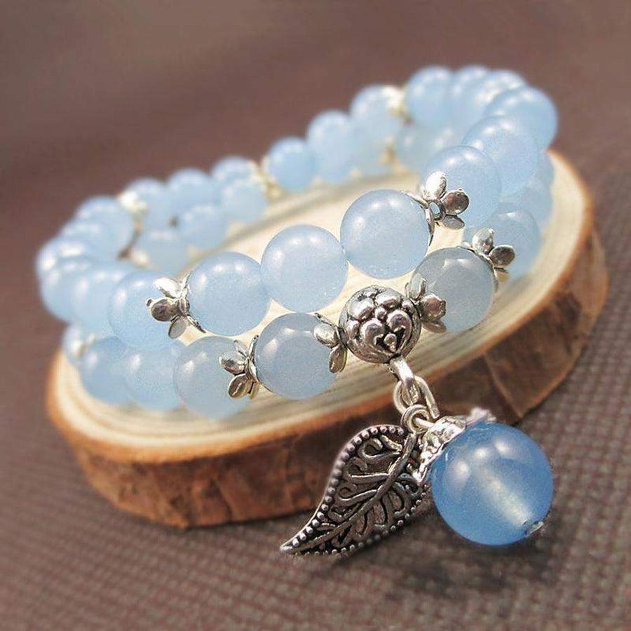 Élégant bracelet avec décorations argentées tibétaines