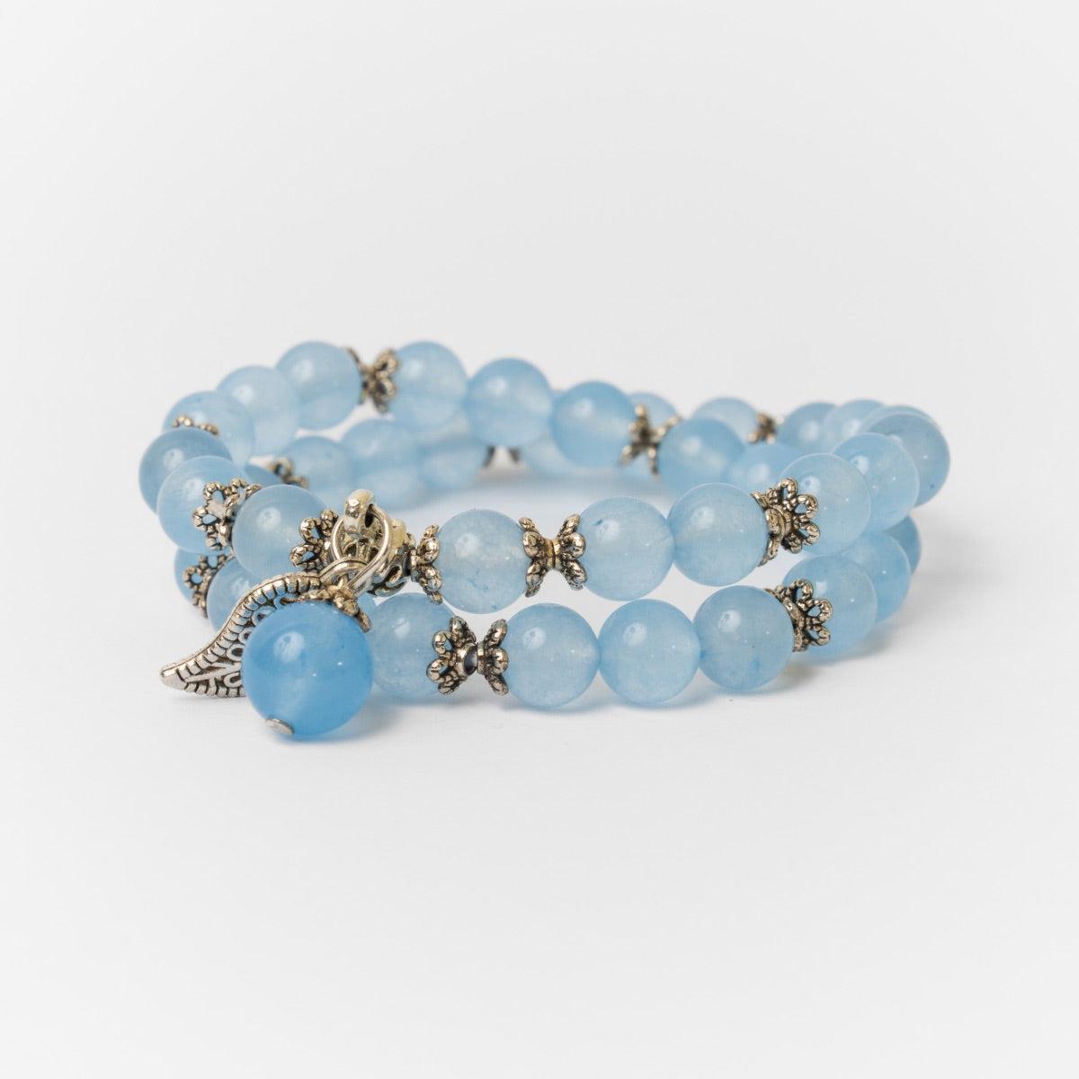 Perles de calcédoine bleues avec accents argentés