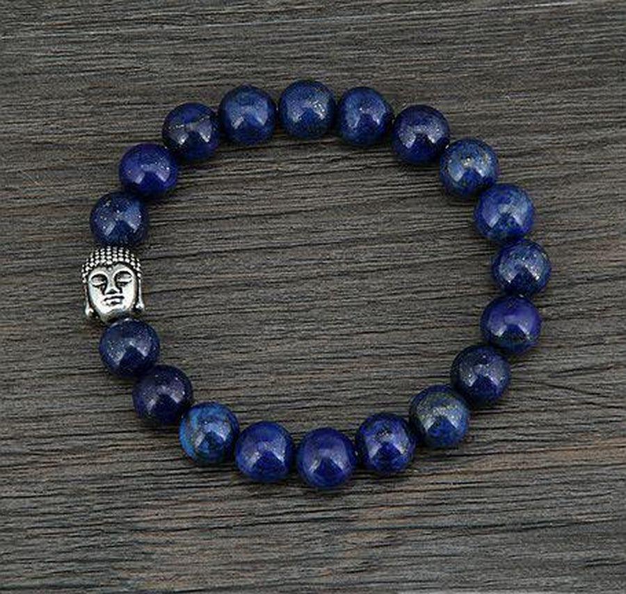 Bracelet anti-stress en Lapis Lazuli posé sur une surface