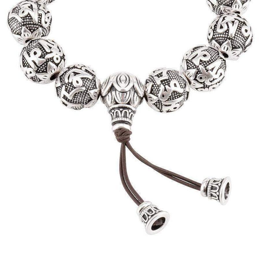 Perles en argent ornées de mantras bouddhistes