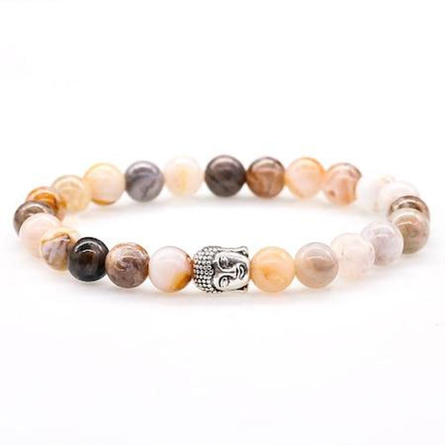 Détail des perles d'onyx avec Bouddha argenté