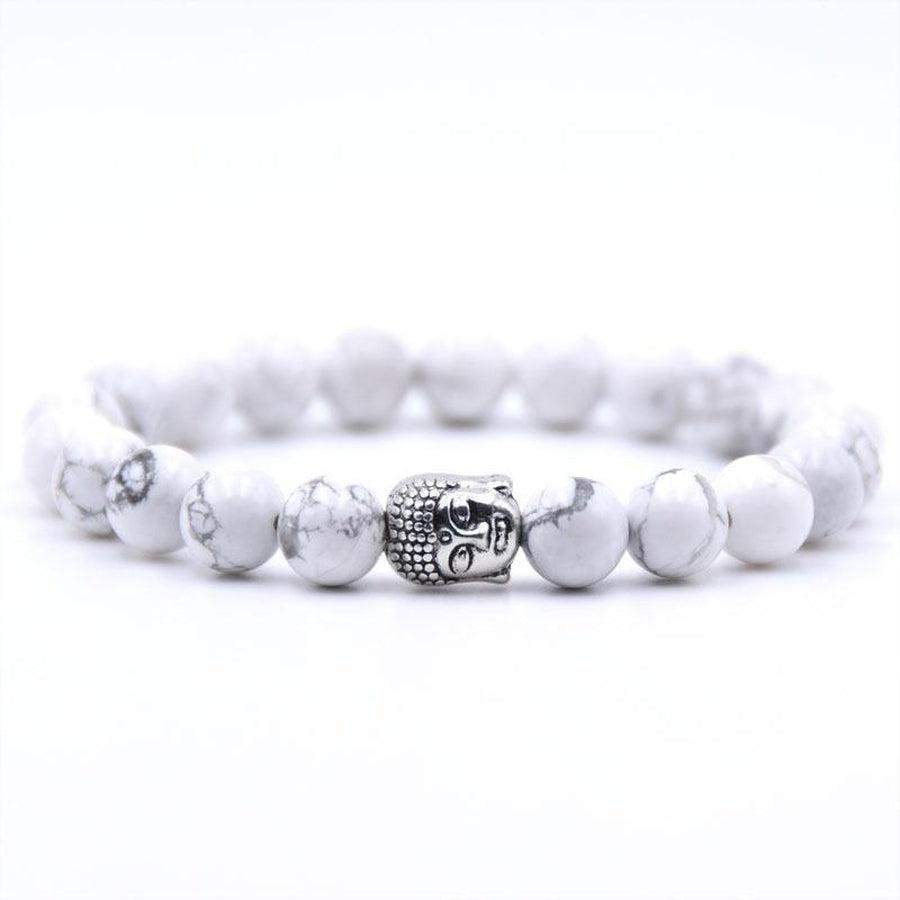 Perles naturelles montées sur bracelet avec tête de Bouddha