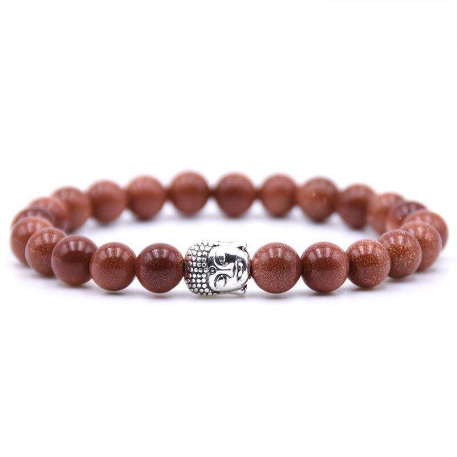 Bracelet en pierres variées, orné d'une tête de Bouddha