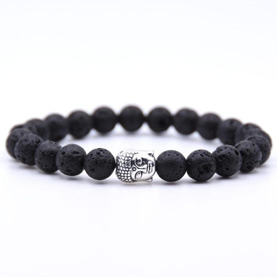 Détail d'un bracelet en pierres polies avec tête de Bouddha