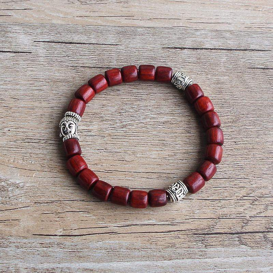 Bracelet élastique avec perles en bois et détails en cuivre