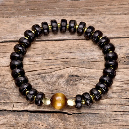 Ensemble du bracelet avec perles coco et pierre œil de tigre