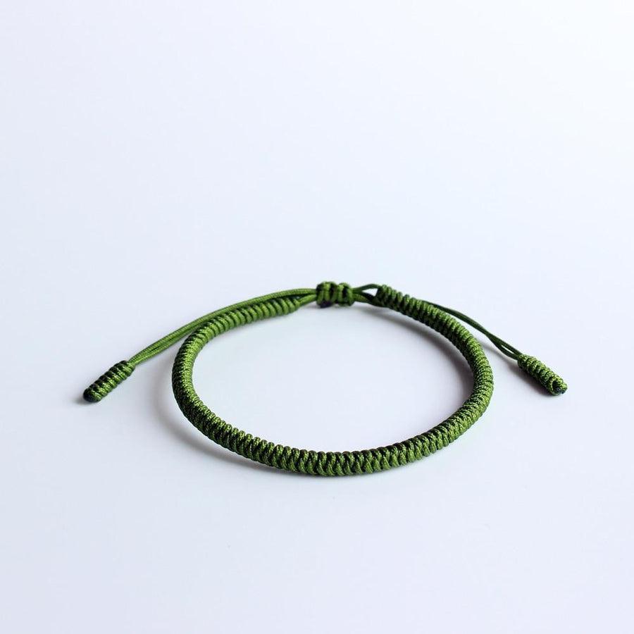 Bracelet bouddhiste rouge avec nœud chanceux détaillé