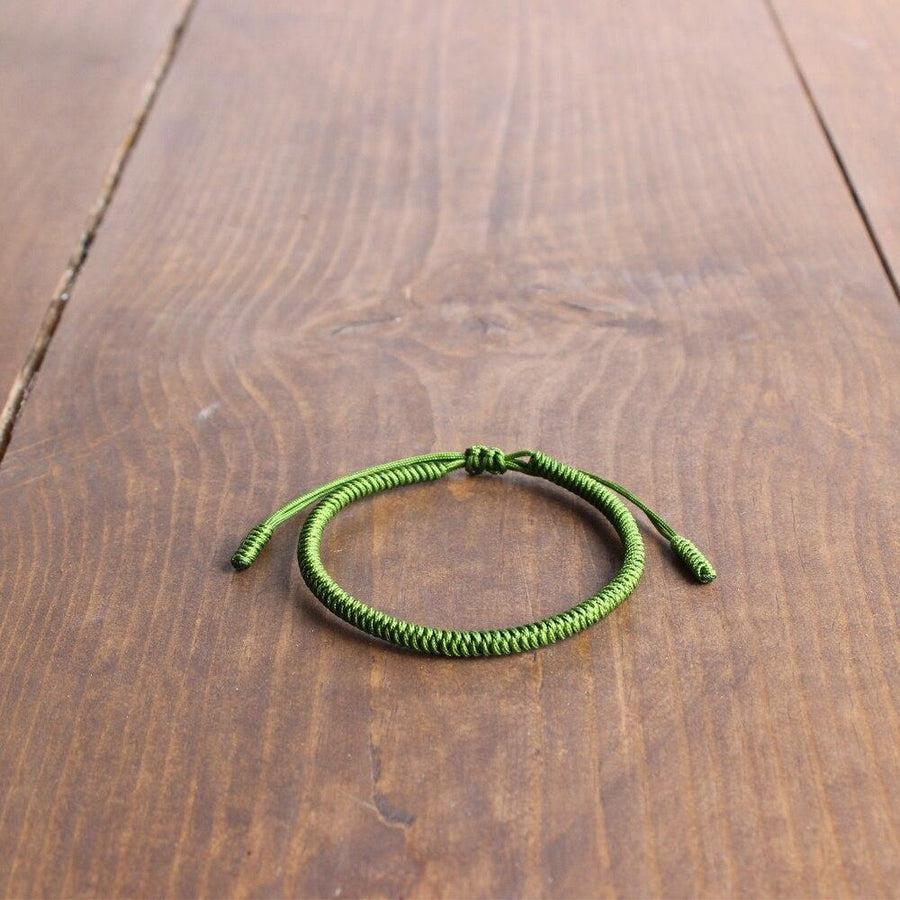 Détail du tissage traditionnel par des moines tibétains