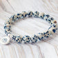 Bracelet jaspe dalmatien avec charm Lotus en détail