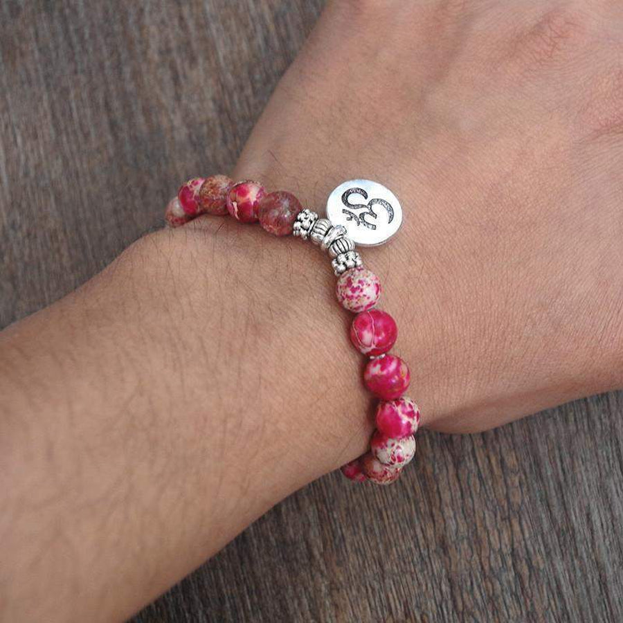 Bracelet agate rose, pendentif Bouddha en alliage métallique