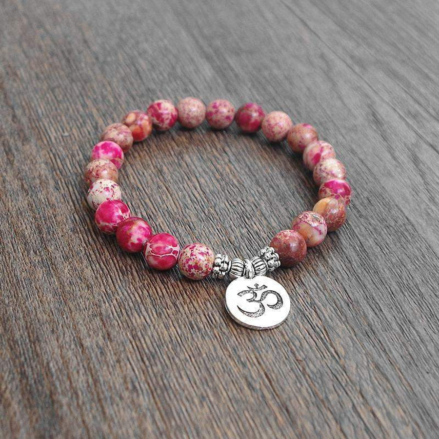 Bracelet agate rose, pendentif Om en alliage cuivre-zinc