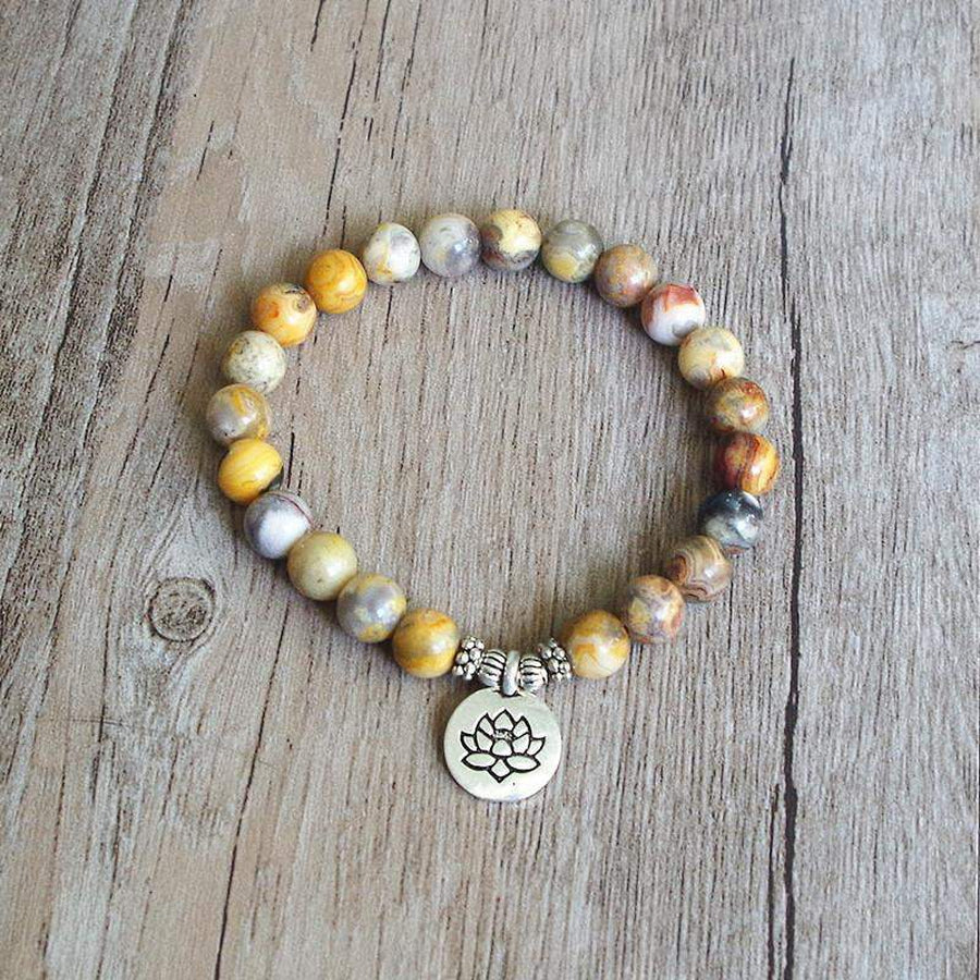 Bracelet jaspe avec perles mouchetées et charm lotus