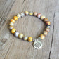 Bracelet jaspe élastique avec charm Om gravé