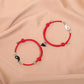 Bracelet Yin Yang rouge et noir sur fond blanc