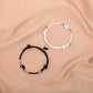 Détail du motif Yin Yang sur bracelet en corde tressée