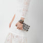 Vue latérale du bracelet ajustable en cuir