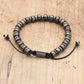 Bracelet Bronzite et Hématite sur fond clair, perles visibles