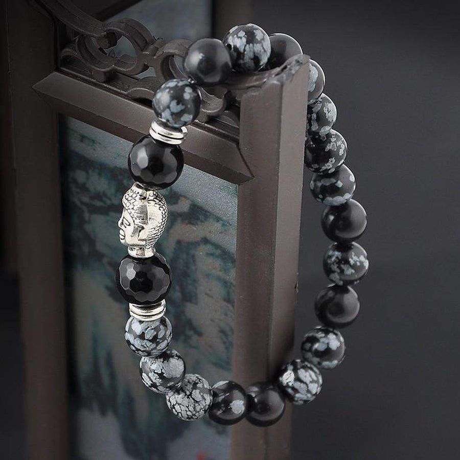 Vue latérale du bracelet Bouddha montrant les perles polies