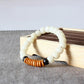 Vue d'ensemble du bracelet en matériaux naturels